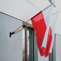 Zestaw: Uchwyt podwójny na flagi grafit + flaga POLSKI 110x70 + styl 120